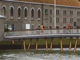 Artist impression van de nieuwe brug naar het Oostereiland